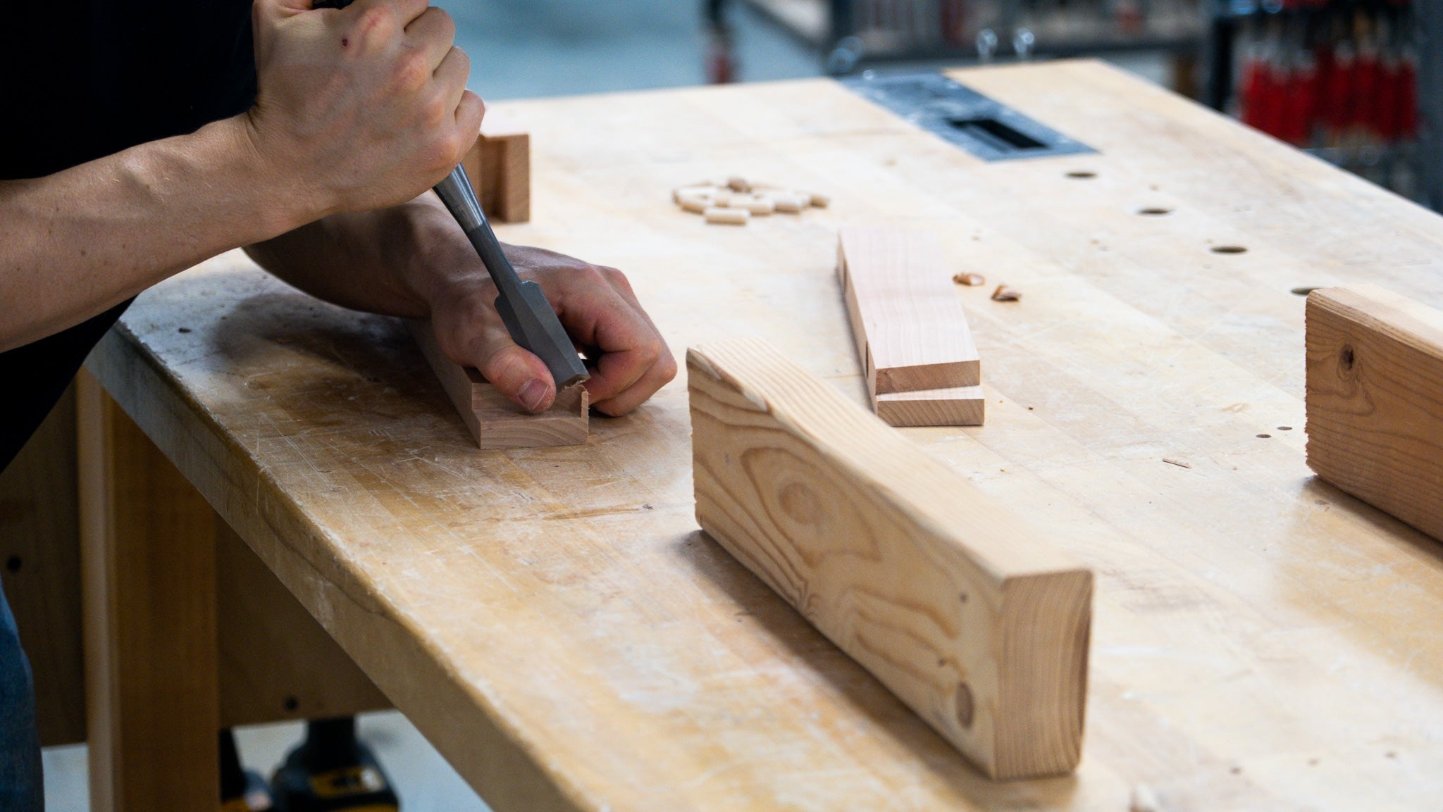 Chiseling out the corner of a table apron